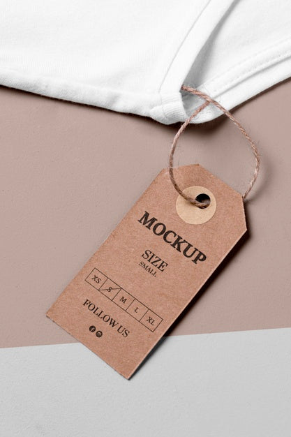 Free Clothing Size Cardboard Mock-Up High View And White Towel Psd