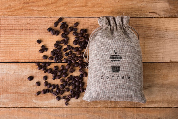 Free Coffee Bag With Beans Beside Psd