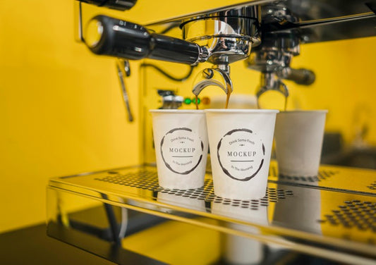 Free Coffee Cup Mock-Ups In Espresso Machine Psd