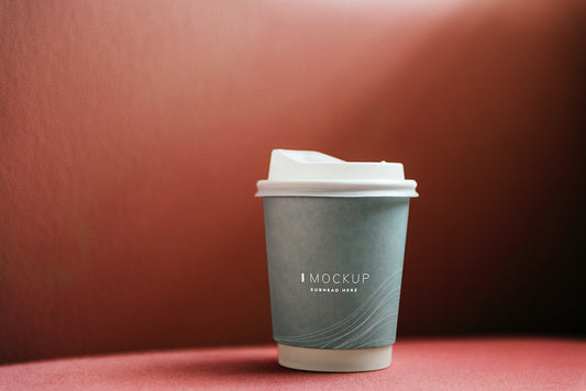 Free Coffee Cup Mockup In A Red Backdrop