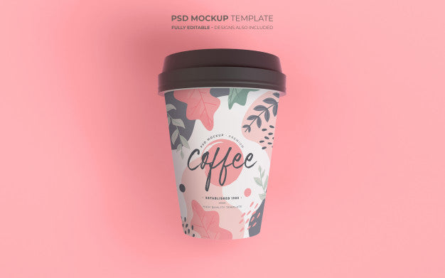 Free Coffee Cup Mockup With Floral Design Psd