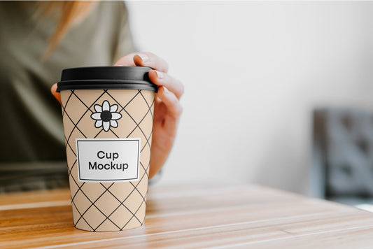 Free Coffee Cup With Hand Mockup