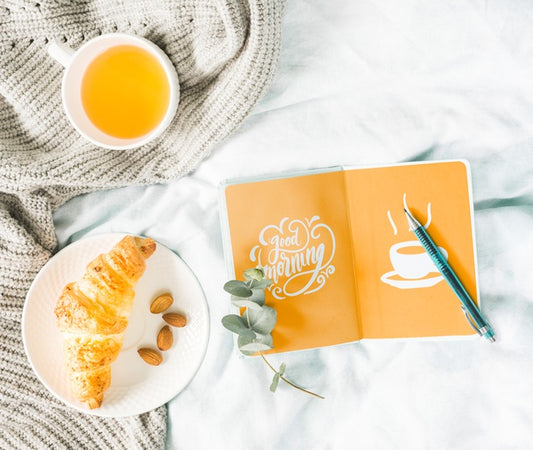Free Collection Of Breakfast Croissants Next To Tea Cup Psd