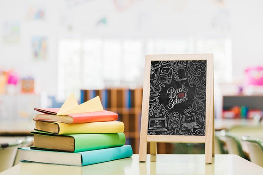 Free Colorful Books Next To School Blackboard Mock-Up Psd
