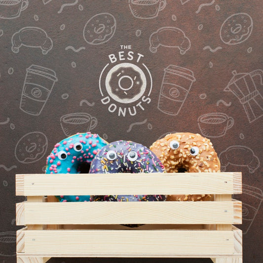 Free Colorful Donuts In Wooden Crate With Mock-Up Psd