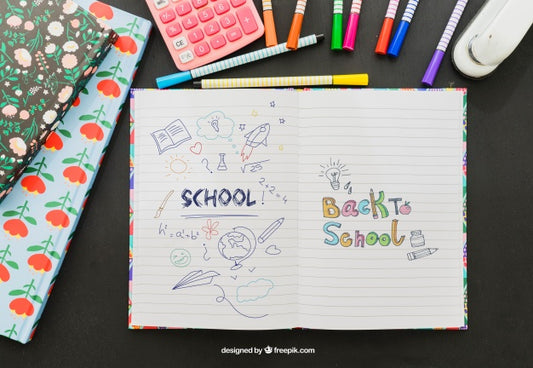 Free Colorful Drawing On The Notebook With School Material Psd