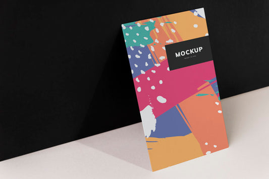 Free Colorful Paperboard Mockup Against The Black Wall Psd