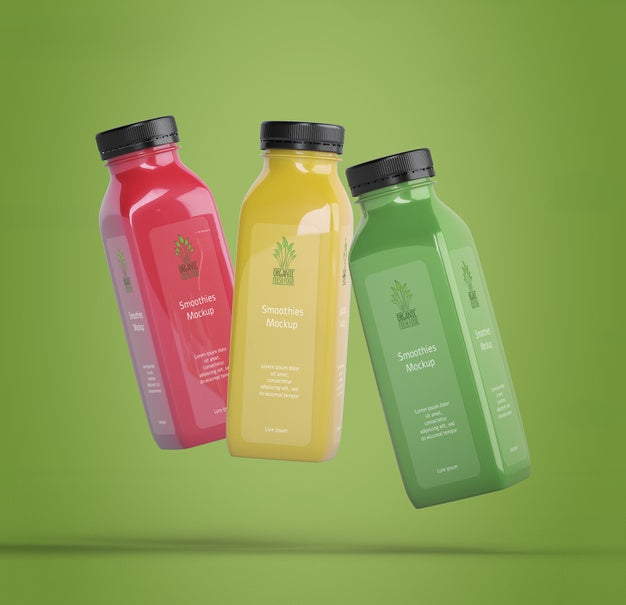 Free Colorful Smoothies On Green Background Psd
