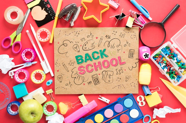 Free Colourful Supplies For School On Red Background Psd