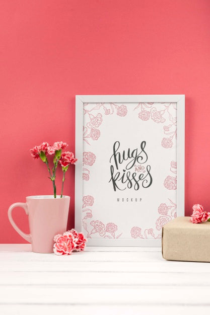 Free Composition Of Carnation Flowers Next To Frame Mockup Psd