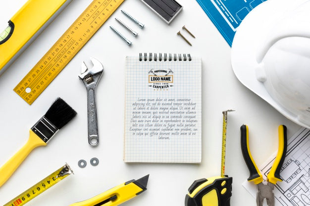 Free Composition Of Different Repairing Tools With Notepad Mock-Up Psd
