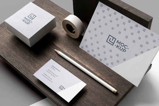 Free Composition Of Mock-Up Stationery On Wood Psd