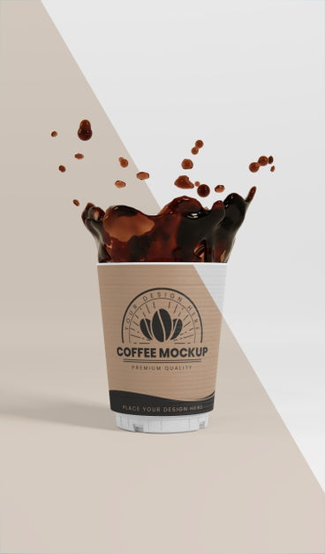 Free Composition Of Paper Coffee Cup With Coffee Splash Psd