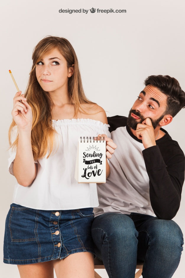 Free Couple Holding Notepad Psd