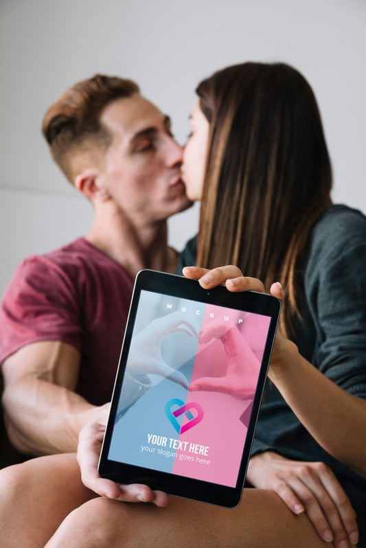 Free Couple Holding Tablet Mockup For Valentine Psd