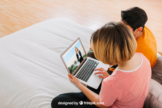 Free Couple With Laptop In Bed Psd