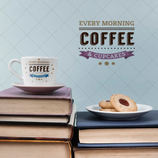 Free Cup Of Coffee And Cookies On A Pile Of Books Psd