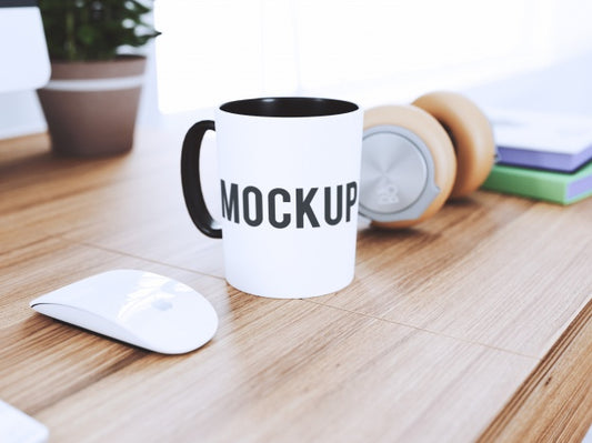 Free Cup On Desk Mock Up Psd