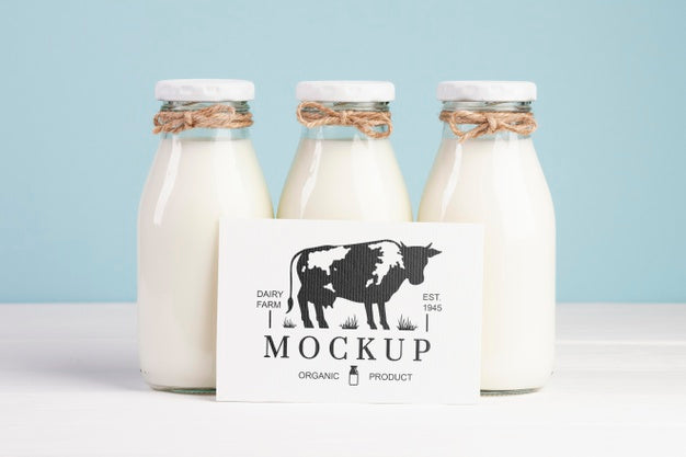 Free Dairy Mock-Up With Milk Bottles And Placeholder Psd