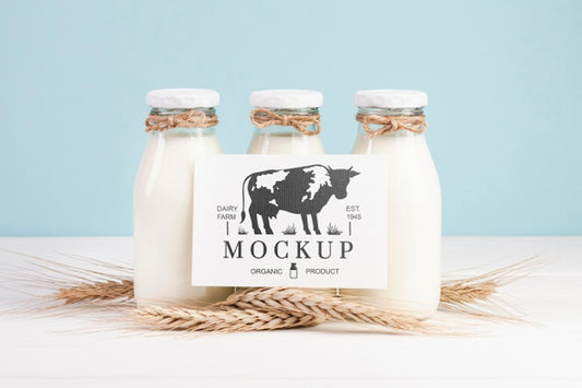 Free Dairy Mock-Up With Milk Bottles And Placeholder Psd