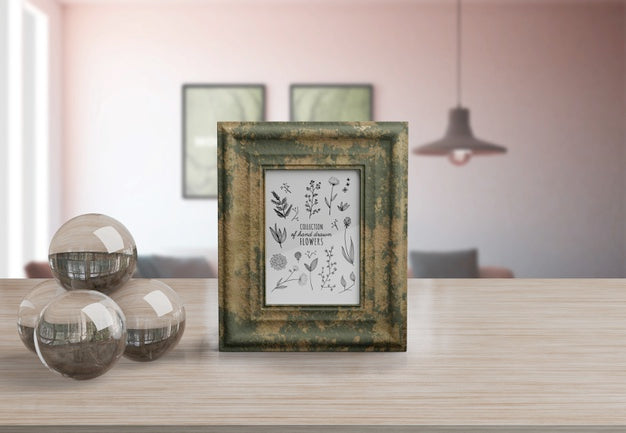 Free Decorative Frame Mockup On Table At Home Psd