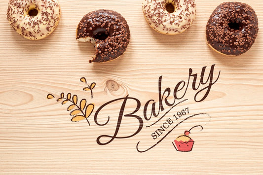 Free Delicious Donuts On Wooden Table Mock-Up Psd