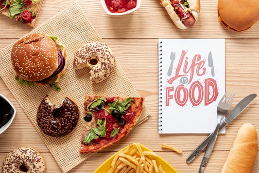 Free Delicious Fast Food On Wooden Table With Notebook Mock-Up Psd