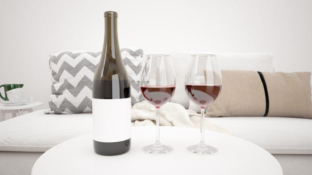 Free Delicious Red Wine In A Modern Living Room Mockup Psd