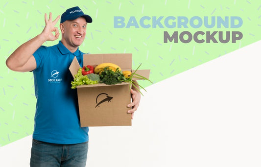 Free Delivery Man Holding A Box Full Of Vegetables Mock-Up Psd