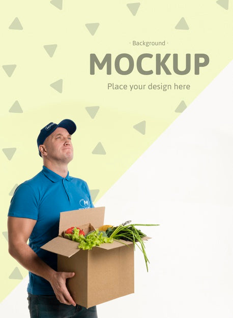 Free Delivery Man Holding A Box With Different Vegetables Psd