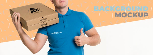 Free Delivery Man Holding Some Pizza Boxes Mock-Up Psd