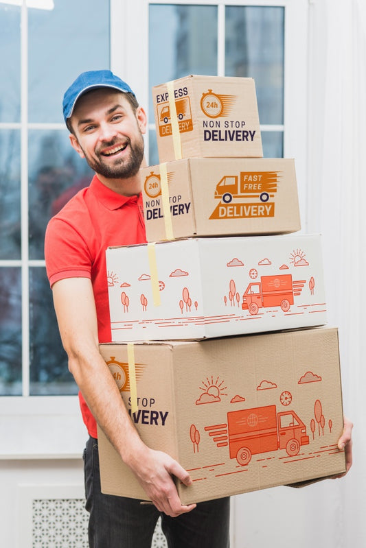 Free Delivery Mockup With Man Holding Boxes Psd
