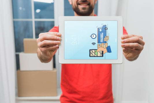 Free Delivery Mockup With Man Holding Tablet Psd