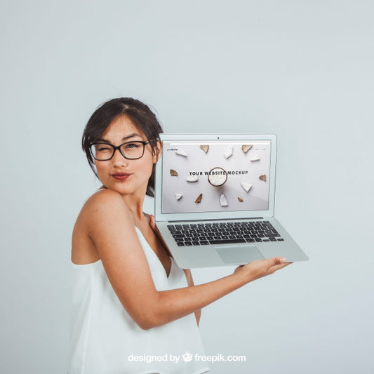 Free Design Of Mock Up With Winking Woman And Laptop Psd