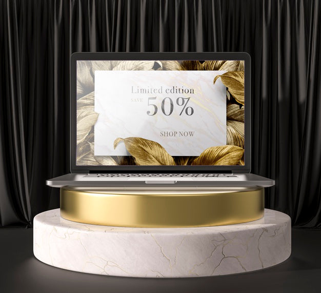 Free Digital Tablet With Golden Leaves On A Holder Psd