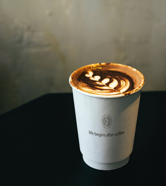 Free Disposable Coffee Paper Cup Mockup Design