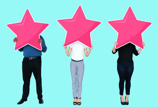 Free Diverse Businesspeople Showing Star Rating Symbols