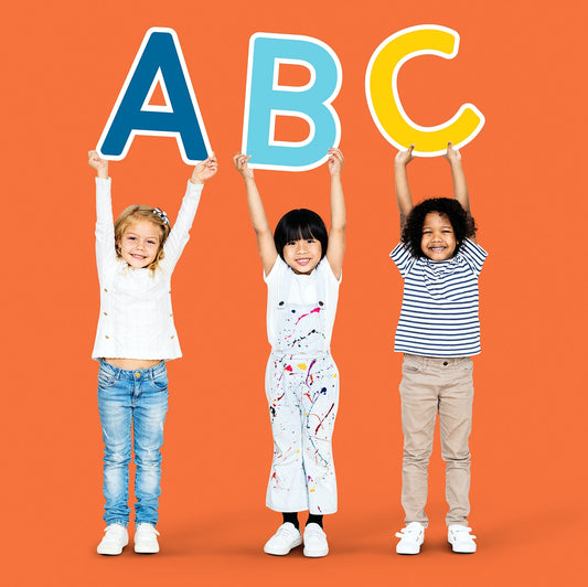 Free Diverse Happy Kids Holding The Abc