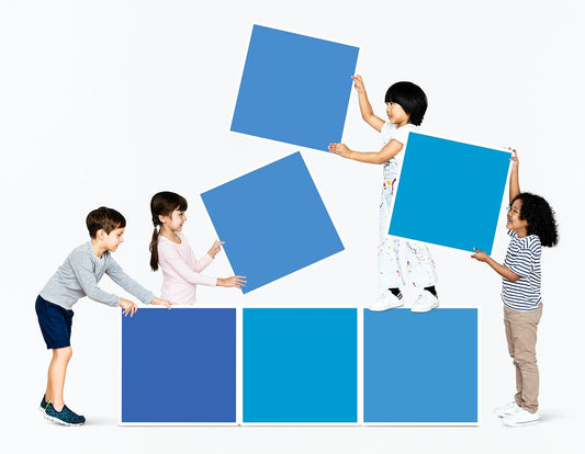 Free Diverse Happy Kids Stacking Empty Square Boards