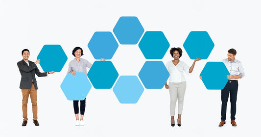 Free Diverse People Showing Blue Hexagon Shaped Boards