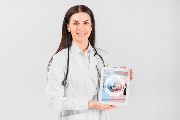 Free Doctor Holding Tablet Mockup For Labor Day Psd