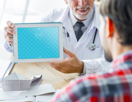 Free Doctor Showing Tablet To Patient Psd