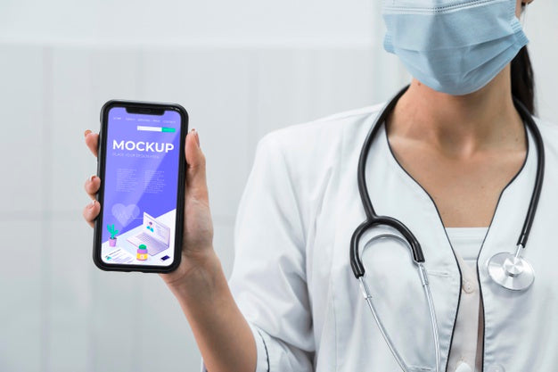 Free Doctor With Face Mask Holding Phone Mock-Up Psd