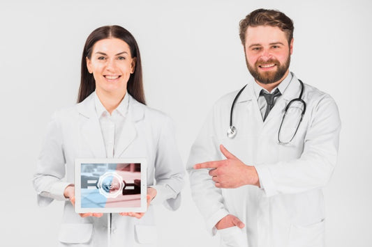 Free Doctors Holding Tablet Mockup For Labor Day Psd