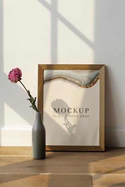 Free Dried Pink Peony Flower In A Gray Vase By A Wooden Frame Mockup Psd