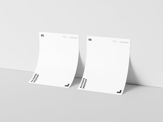 Free Dual A4 Paper Against Wall Mockup