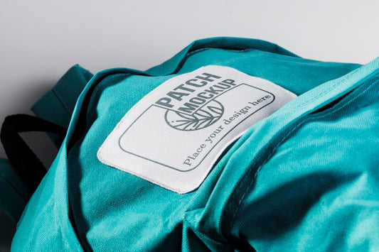 Free Fabric Clothing Patch Mock-Up On Blue Backpack Psd