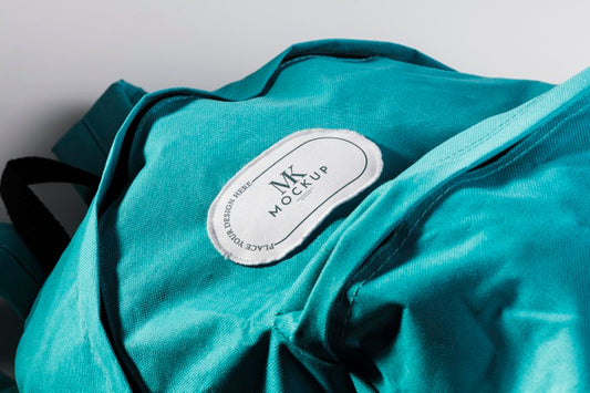 Free Fabric Clothing Patch Mock-Up On Blue Backpack Psd