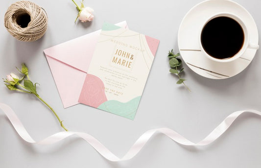 Free Fat Lay Of Wedding Card With Ribbon And Coffee Psd