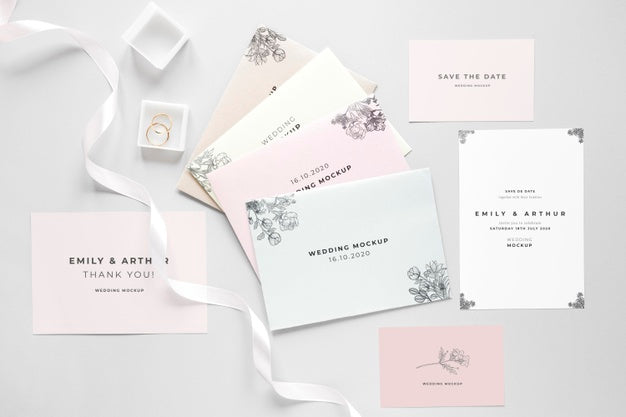 Free Fat Lay Of Wedding Card With Ribbon And Rings Psd